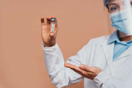 Covid-19 (coronavirus) vaccination campaign in a clinic - People getting vaccinated from doctor and nurse to prevent corona virus outbreak in a vaccination pointの写真素材