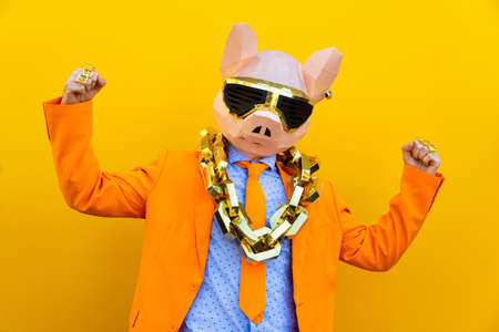 Cool man wearing 3d origami mask with stylish colored clothes - Creative concept for advertising,...
