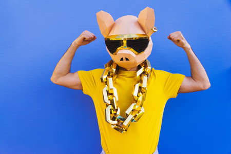 Cool man wearing 3d origami mask with stylish colored clothes - Creative concept for advertising,...