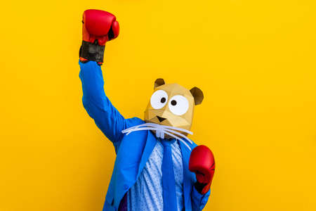 Cool man wearing 3d origami mask with stylish colored clothes - Creative concept for advertising,...
