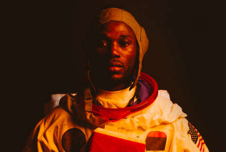 Cinematic image of an astronaut. Colorful portrait of a man with spacesuit