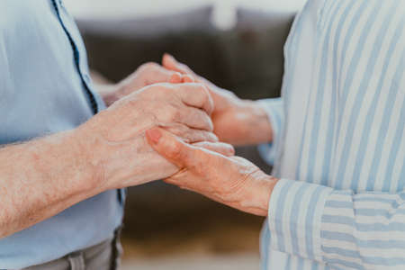 Senior couple together at home, happy moments - Elderly people taking care of each other, grandparents in love - concepts about elderly lifestyle and relationshipの写真素材