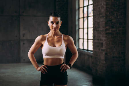 beautiful woman training and making functional workout in the gymの写真素材