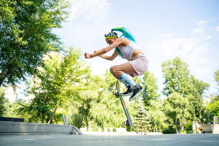Professional skateboarders having fun at the skate parkの写真素材