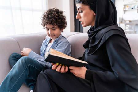 happy family spending time together. Arabian parents and kid lifestyle moments at home