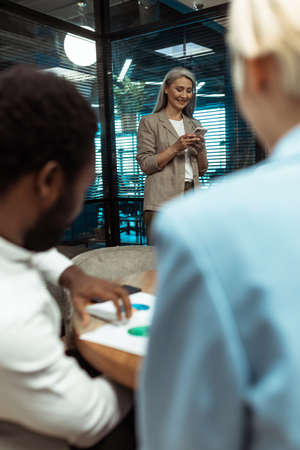 cinematic image of a multiethnic business team. employees working together in a modern office