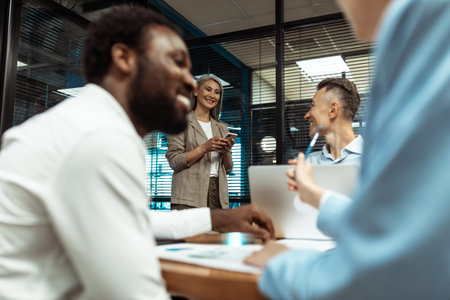 cinematic image of a multiethnic business team. employees working together in a modern office