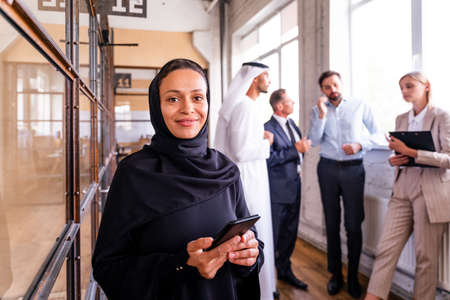 Multiethnic corporate business team meeting in the office for a strategic marketing plan - Office workers, entrepreneurs and company employee at work in a multinational companyの写真素材