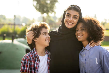 Cinematic image of a family playing at the playground in Dubaiの写真素材