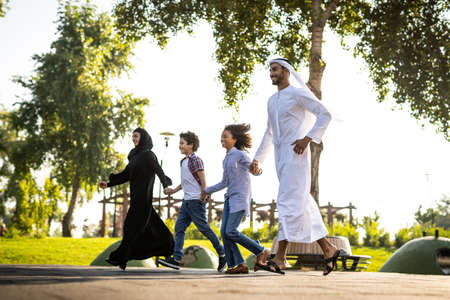 Cinematic image of a family playing at the playground in Dubaiの写真素材