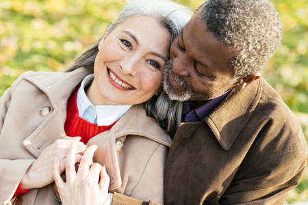 Storytelling image of a multiethnic senior couple in loveの写真素材