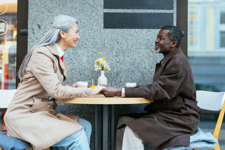 Storytelling image of a multiethnic senior couple in love