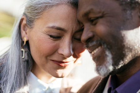 Storytelling image of a multiethnic senior couple in loveの写真素材