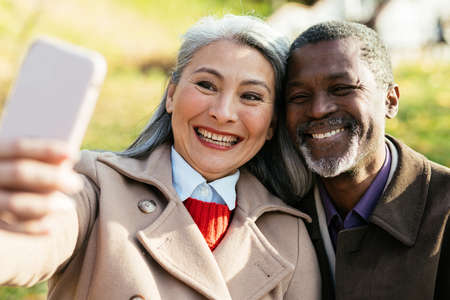 Storytelling image of a multiethnic senior couple in loveの写真素材