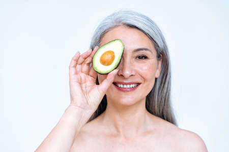 Image of a senior woman posing in studio for a body positive concepts photoshooting. old model...