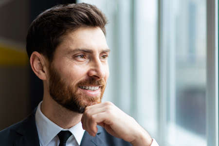 Businessman with elegant suit in the office -Handsome caucasian adult man, concepts about business and peopleの写真素材