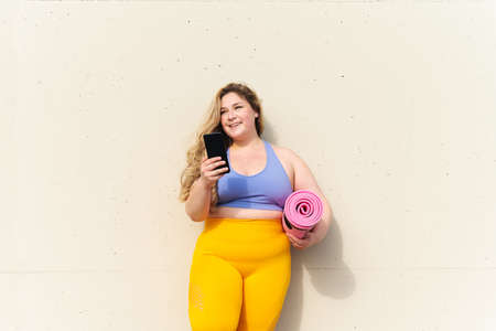 Beautiful and cheerful plus size young woman outdoors - Pretty overweight curvy female, concepts...