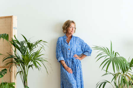 Beautiful mature senior woman at home, domestic life and leisure moments - 50-60 years old pretty...