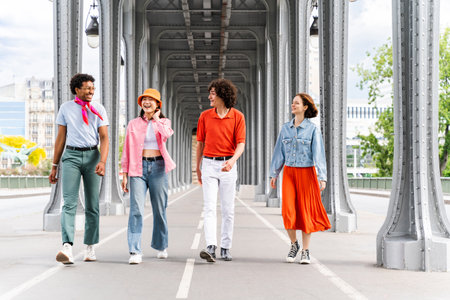 Group of young happy friends visiting Paris and Eiffel Tower, Trocadero area and Seine river - Multicultural group of tourists sightseeing the France capital cityの写真素材