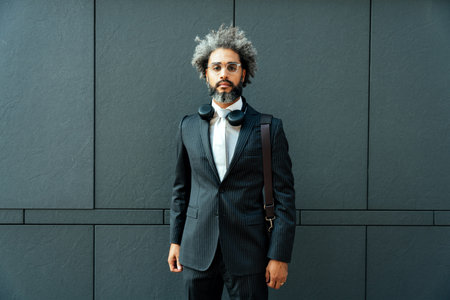 Cinematic and storytelling image of a young entrepreneur going to work in his successful start up business about technology and green energy. Corporate and lifestyle conceptsの写真素材