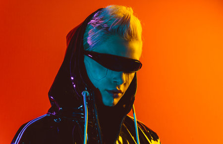 Representation of a bionic super human with advanced technology parts as vr visors and gadgets playing in a mixed reality training room. Futuristic cyberpunk evolution of human mankind and AIの写真素材