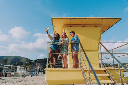 Group of beautiful plus size women with swimwear bonding and having fun at the beach - Group of...