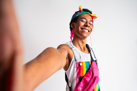 Fluid gender hispanic latin black man posing in studio with fashionable clothing, concepts about LGBTQ, genderless and diversityの写真素材