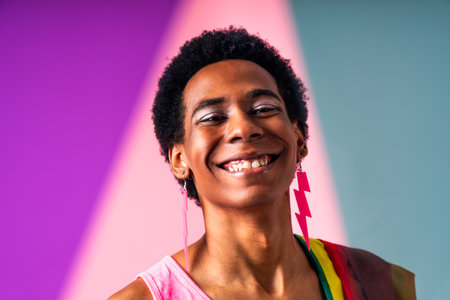 Fluid gender hispanic latin black man posing in studio with fashionable clothing, concepts about...