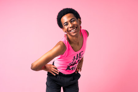 Fluid gender hispanic latin black man posing in studio with fashionable clothing, concepts about LGBTQ, genderless and diversityの写真素材