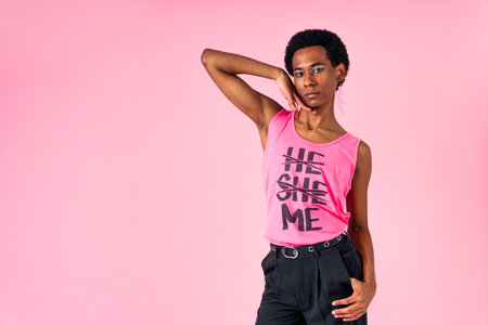 Fluid gender hispanic latin black man posing in studio with fashionable clothing, concepts about LGBTQ, genderless and diversityの写真素材