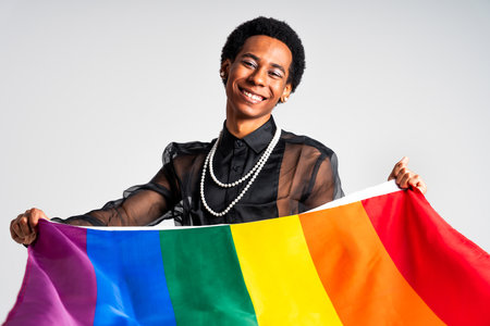 Fluid gender hispanic latin black man posing in studio with fashionable clothing, concepts about LGBTQ, genderless and diversityの写真素材