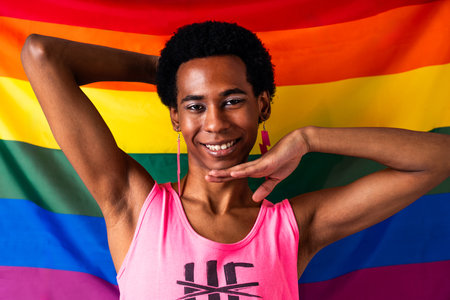 Fluid gender hispanic latin black man posing in studio with fashionable clothing, concepts about...