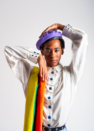 Fluid gender hispanic latin black man posing in studio with fashionable clothing, concepts about...
