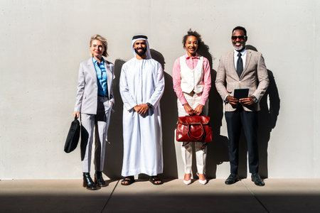 Group of multiethnic business people meeting an emirate businessman - International corporate...