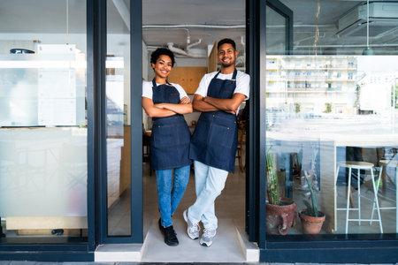 Bakery, happy portrait of hispanic black man and woman in cafe ready for serving pastry, coffee and...