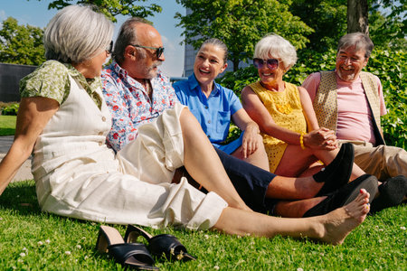 Group of senior friends meeting outdoors in the city and having fun - Cheerful old people bonding together, concepts about elderly, quality of life and aging lifestyleの写真素材