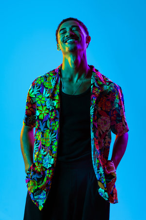 African man young portrait in studio on colorful background - Cool black young male with stylish...