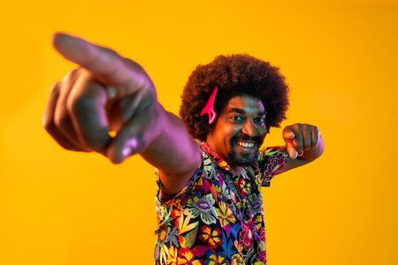 African man portrait in studio on colorful background - Cool black young male with stylish attire...