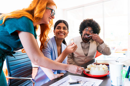 Multiethnic small group of businesspeople meeting in a coworking corporate company office - Young coworkers colleagues working together in a creative startup tech company, concepts about business and daily office lifestyleの写真素材