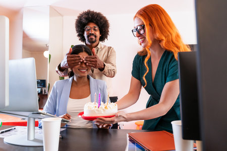 Multiethnic small group of businesspeople meeting in a coworking corporate company office - Young coworkers colleagues working together in a creative startup tech company, concepts about business and daily office lifestyleの写真素材