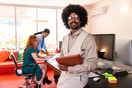 Multiethnic small group of businesspeople meeting in a coworking corporate company office - Young...