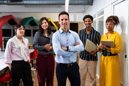 Confident business team smiling in a modern office, embodying teamwork, collaboration, and success...