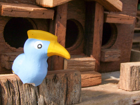 Wooden postal boxes and birdsの写真素材