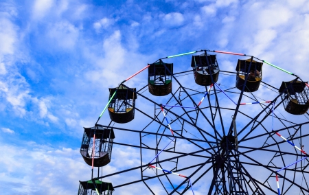 Ferris wheel against sky backgroundの写真素材