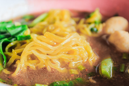yellow noodles in Thai street marketの写真素材