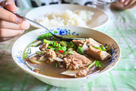 This is Thai food. hot and sour soup with porkの写真素材