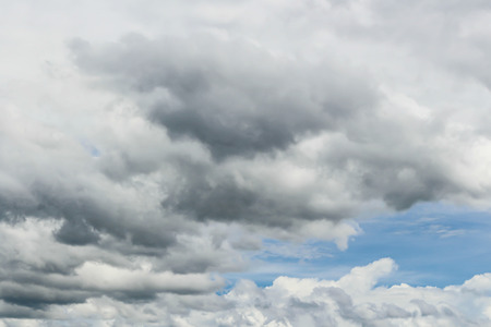 Dark ominous clouds in rainy seasonの写真素材