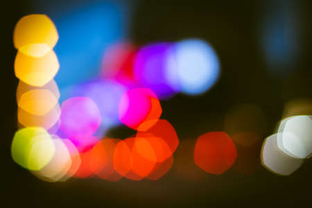 Abstract background with blurred lights from traffic lightの写真素材