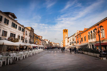 Panoramic view of the urban landscape of the center of Chioggia - near Venice - with typical ancient italian buildingsの写真素材