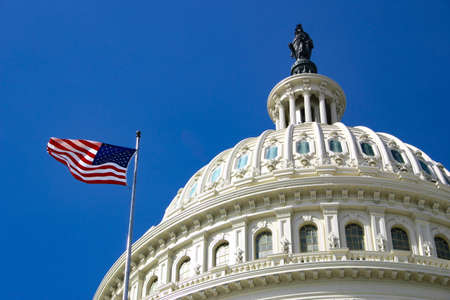 1 November 2020 Washington DC US - American flag in front of Capitol Hill in Washington DC with dome in daylight and facade detailsのeditorial素材